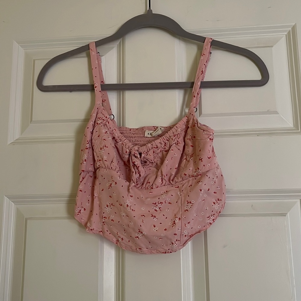 Pink corset-inspired cropped cami top